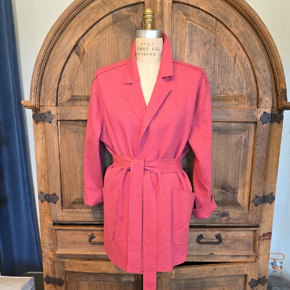 Woman Within Pink Belted Jacket